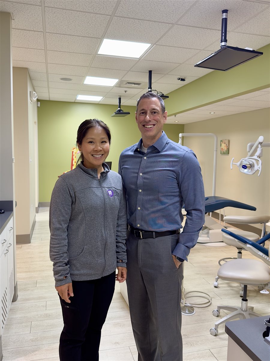 Jeremy Farkas and Dr. Loan Nguyen in a dental operatory
